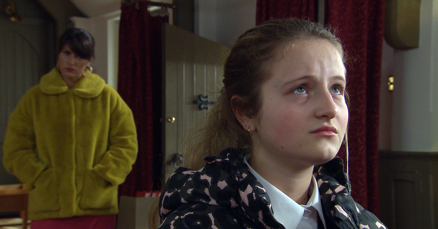 Emmerdale Kerry watches Amelia in the church
