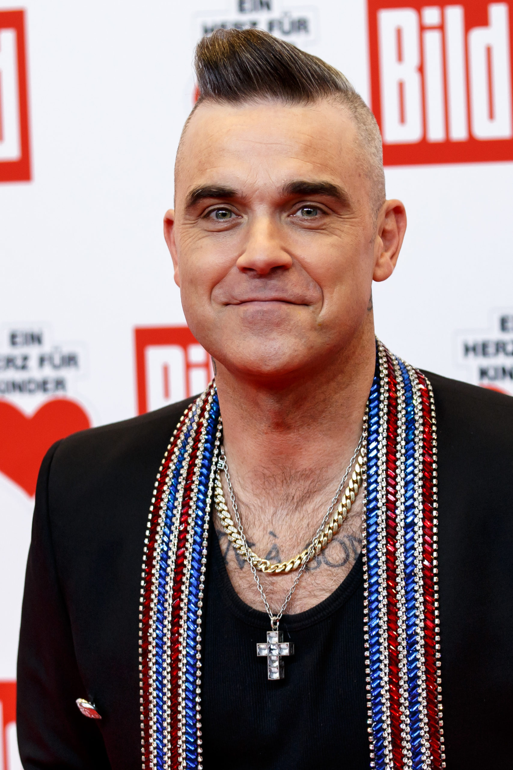 Coronavirus has put Robbie's TV plans on hold (Credit: SplashNews.com)