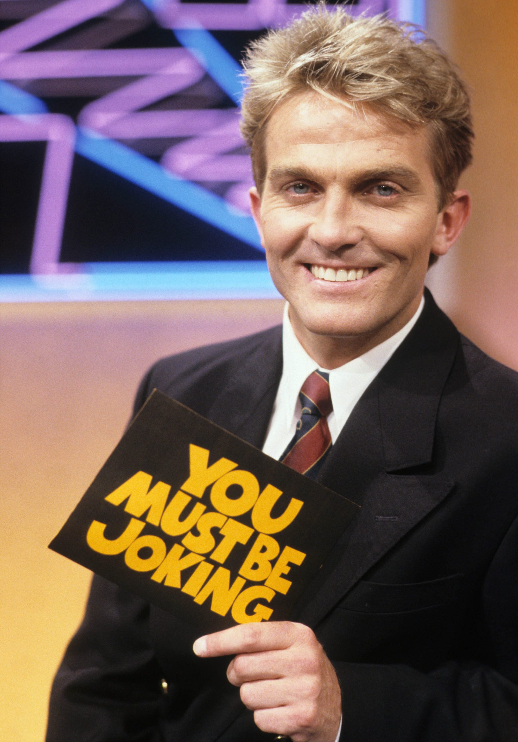 Bradley, looking a lot like son Barney, in his early TV days (Credit: ITV)