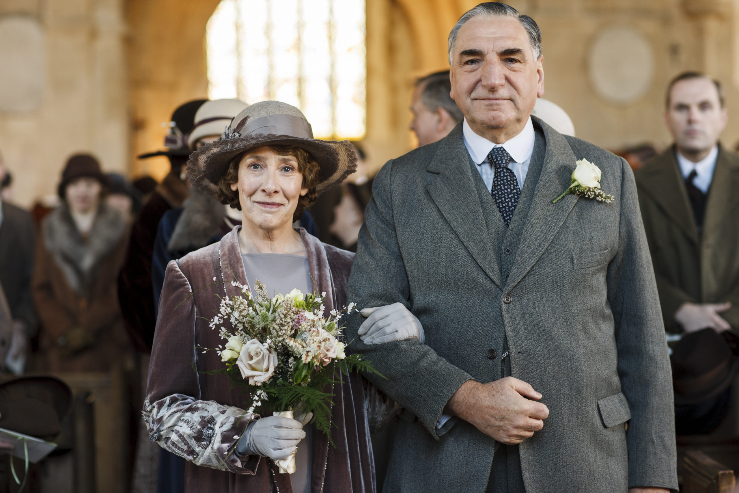 Downton Abbey | Series Six We return to the sumptuous setting of Downton Abbey for the sixth and final season of this internationally acclaimed hit drama series. As our time with the Crawleys begins to draw to a close, we see what will finally become of them all. The family and the servants, who work for them, remain inseparably interlinked as they face new challenges and begin forging different paths in a rapidly changing world. Photographer: Nick Briggs PHYLLIS LOGAN as Mrs Hughes & JIM CARTER as Mr Carson