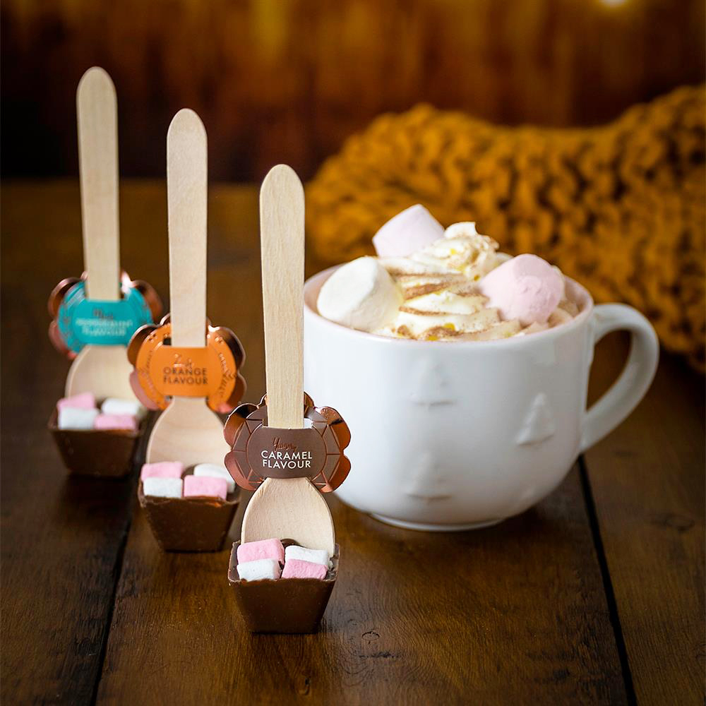Home Bargains hot chocolate stirrers next to a mug