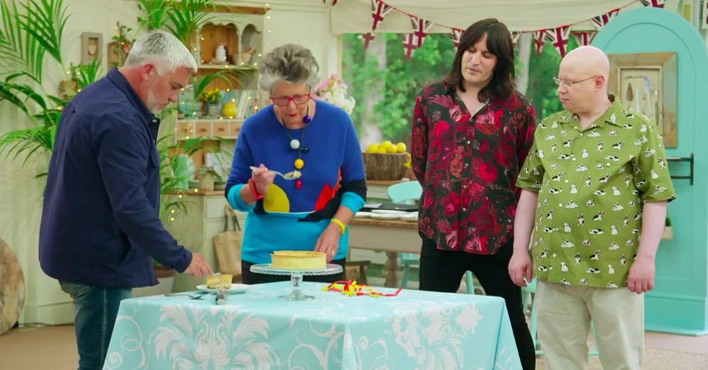 Great British Bake Off judges and hosts eating cake