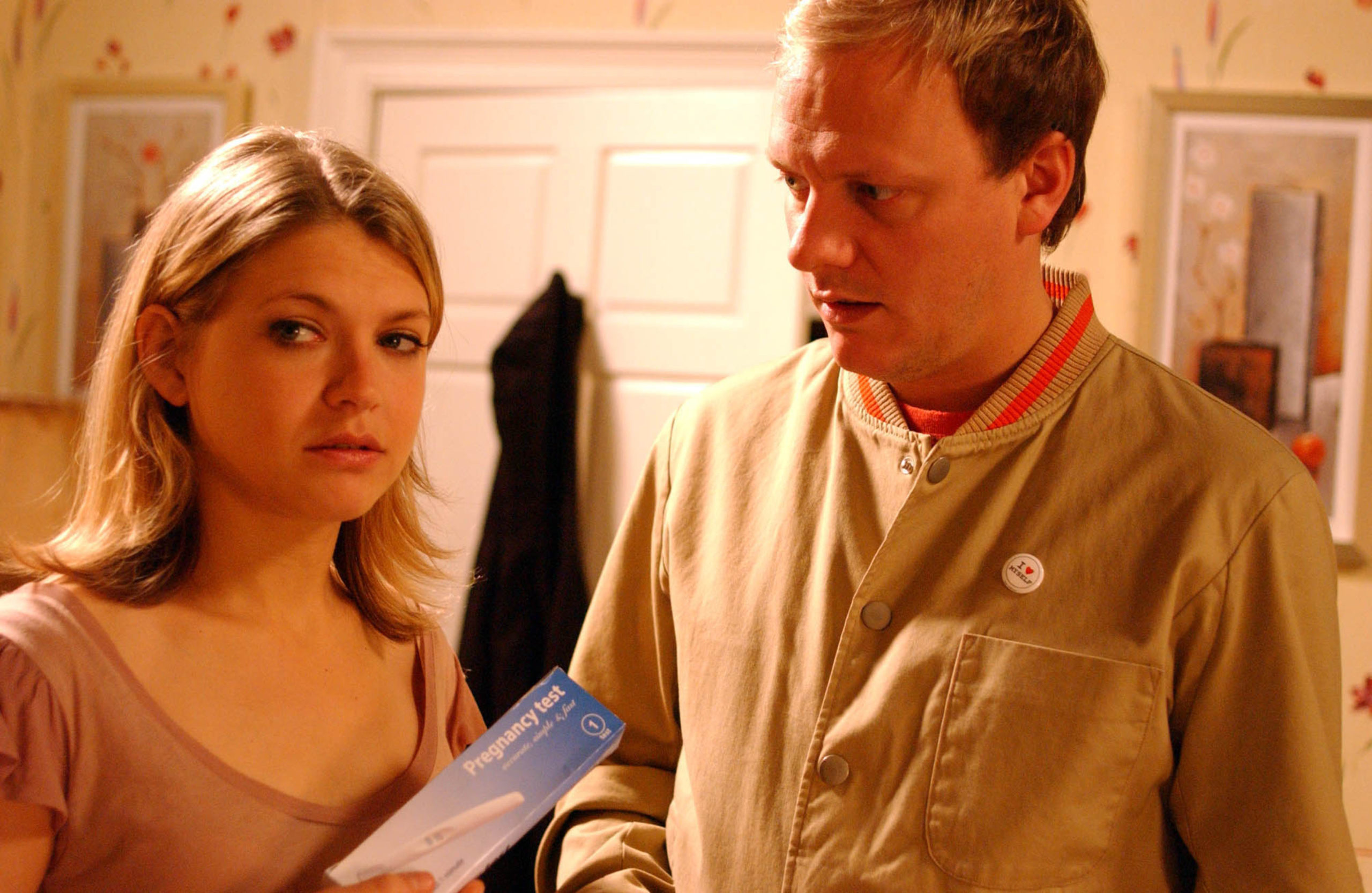 Violet holding a pregnancy test with Sean in Coronation Street