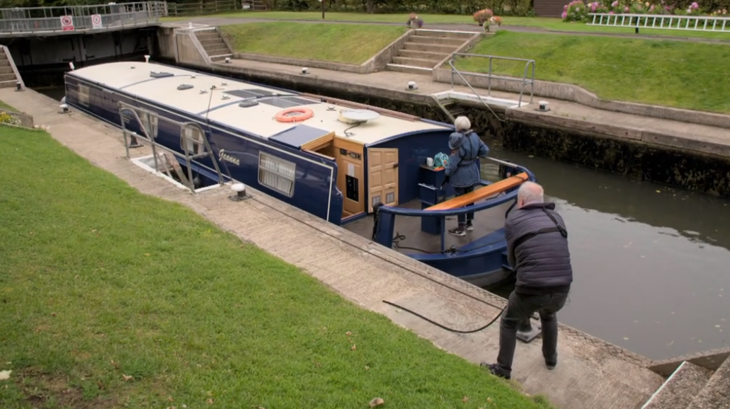 Sheila Hancock and Gyles Brandreth piloting a narrowboat