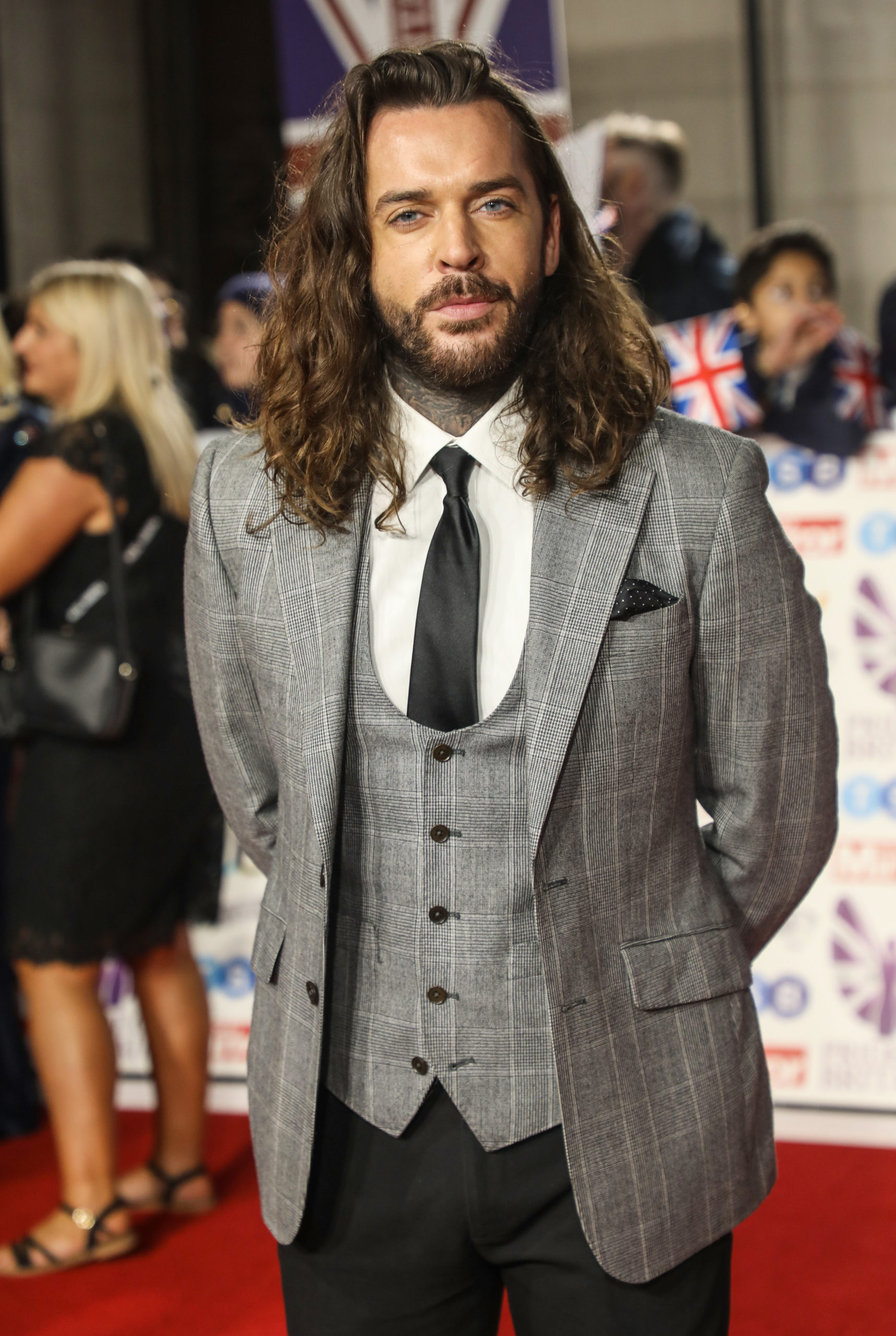Pete wicks posing on the red carpet