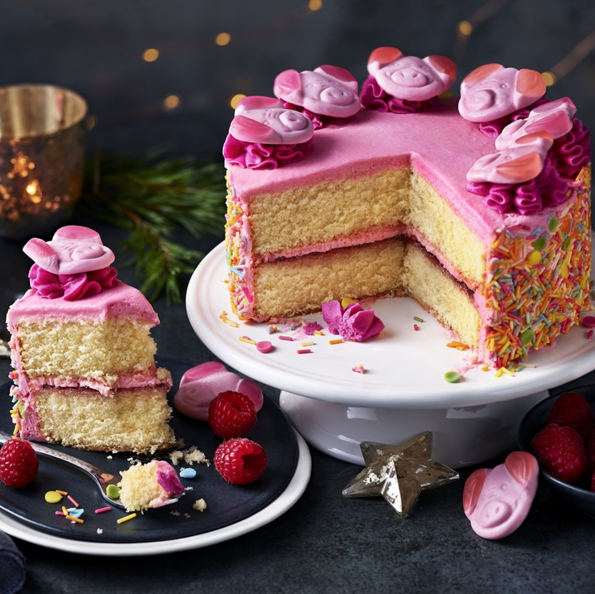 Percy Pig cake on a cake stand