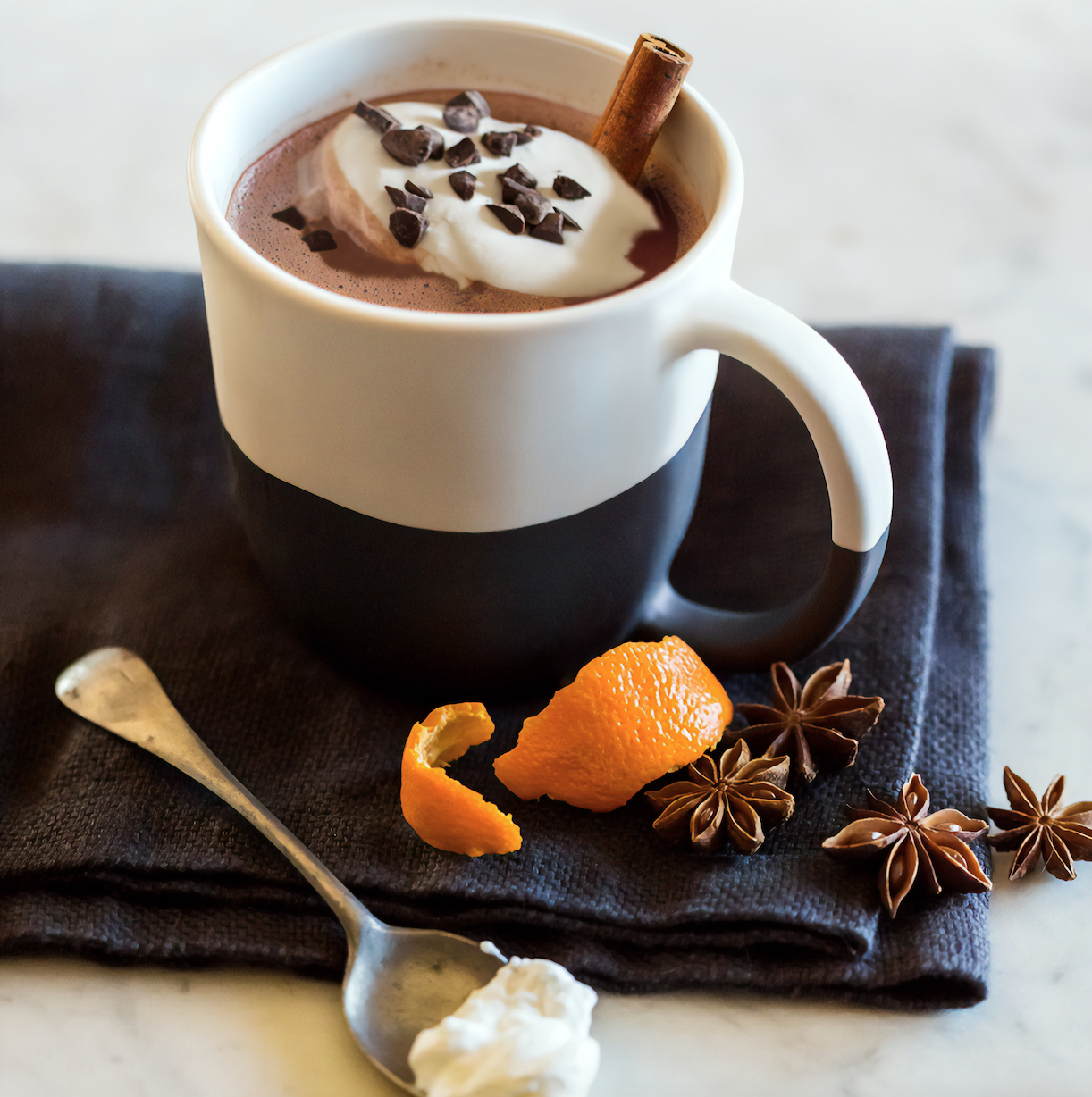mug of hot chocolate with orange rind