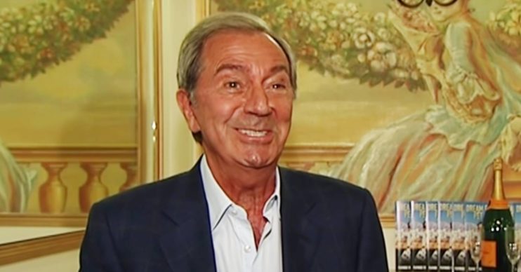 Des O'Connor smiling in an interview