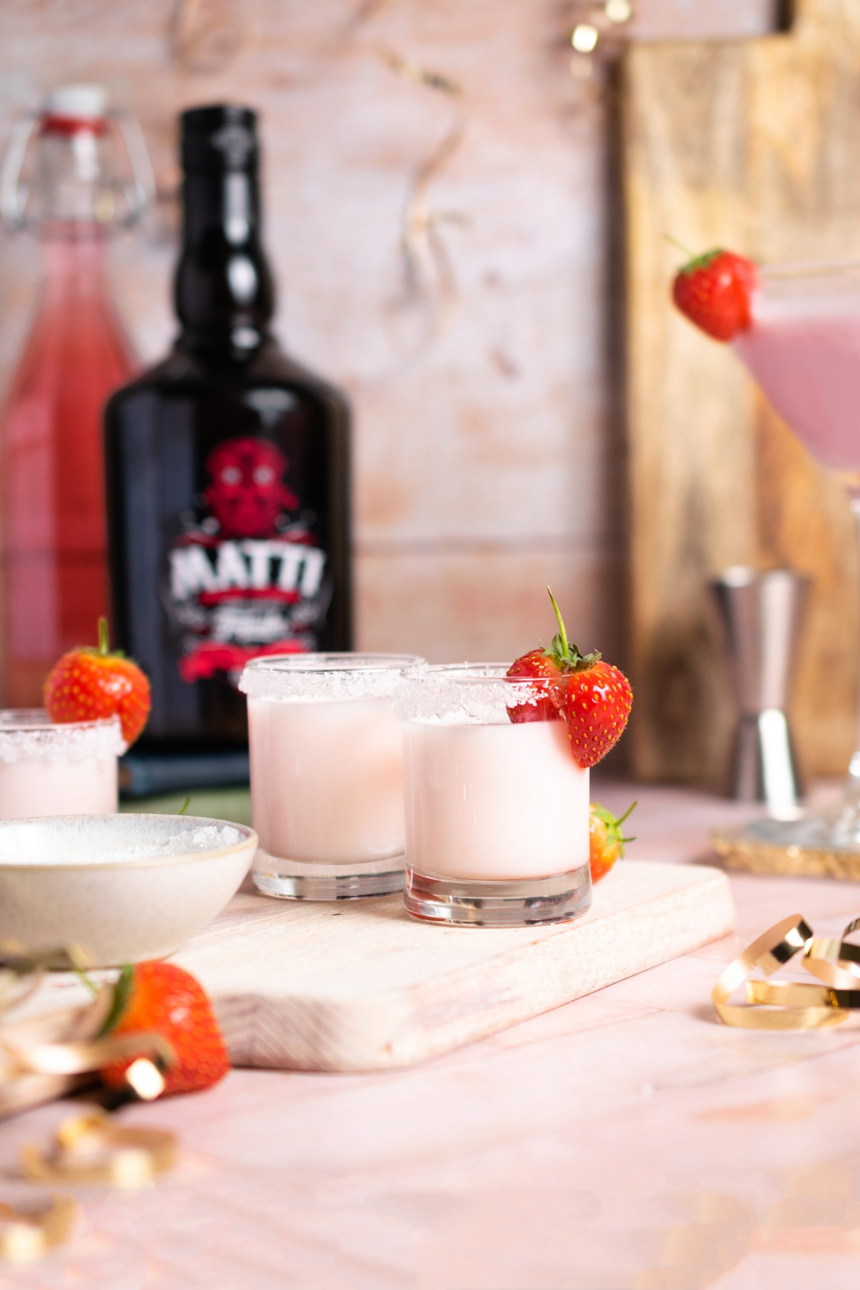 glasses of strawberry cream liqueur
