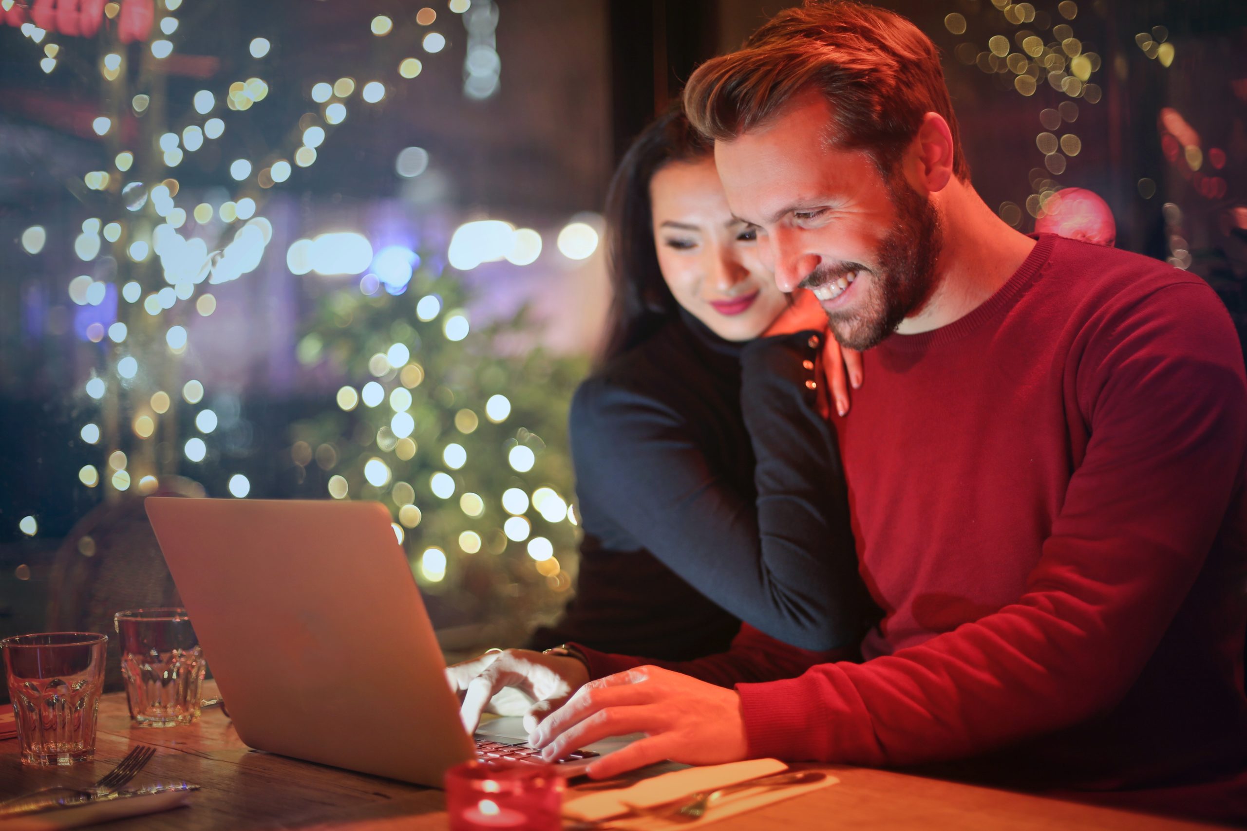 couple doing their Christmas shopping online