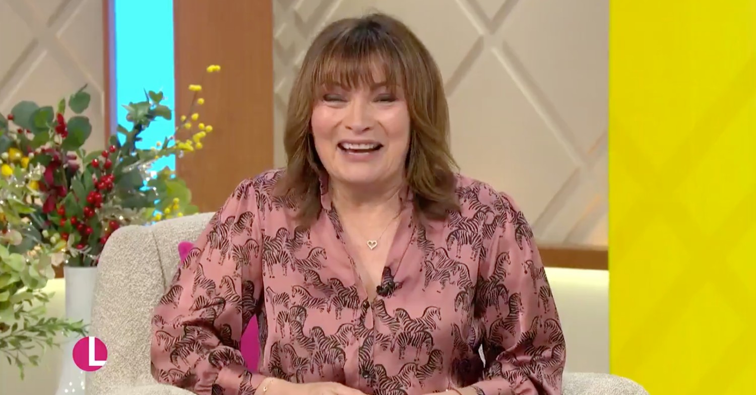 Lorraine Kelly laughing over her outfit 