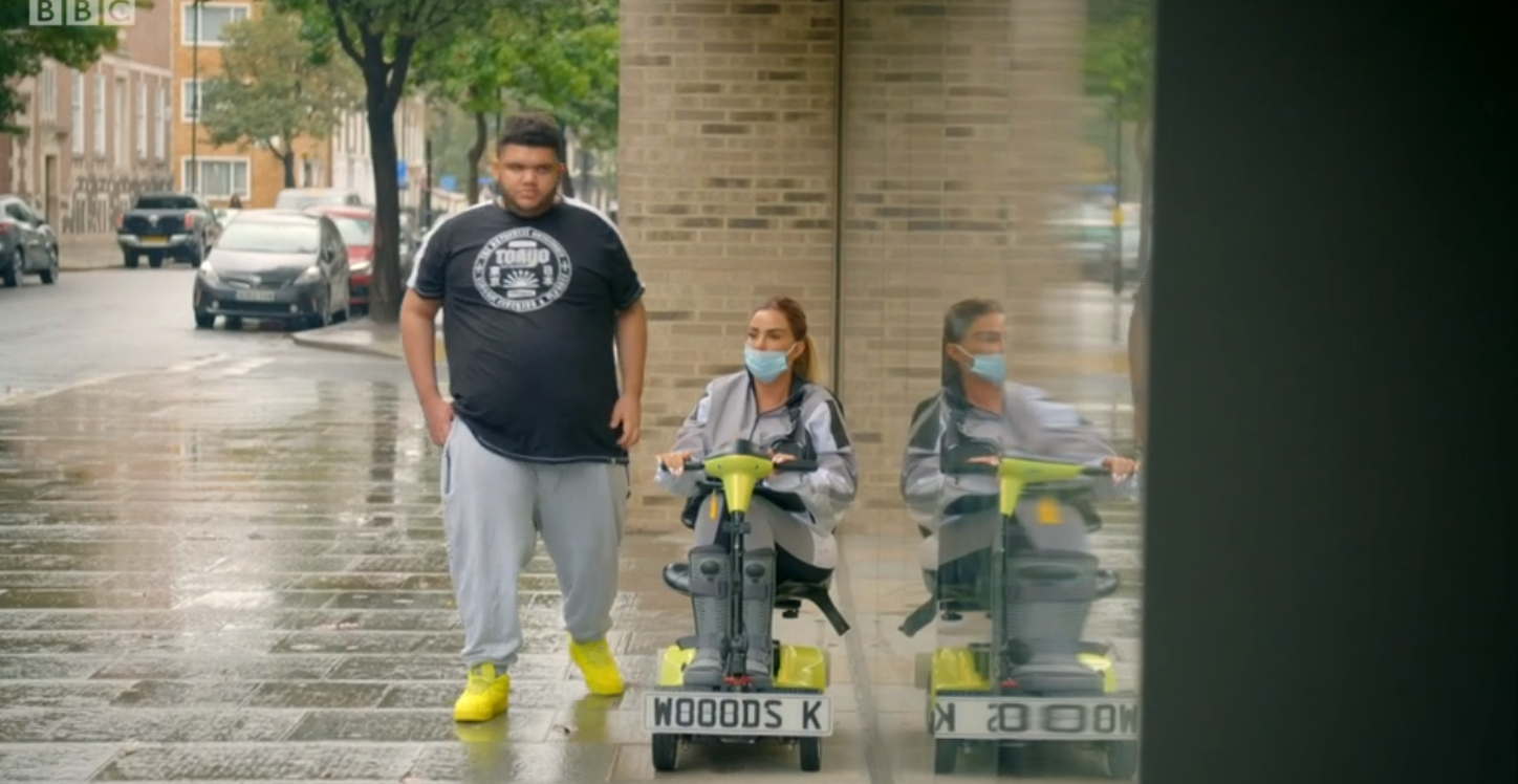 Riding a mobility scooter with son Harvey