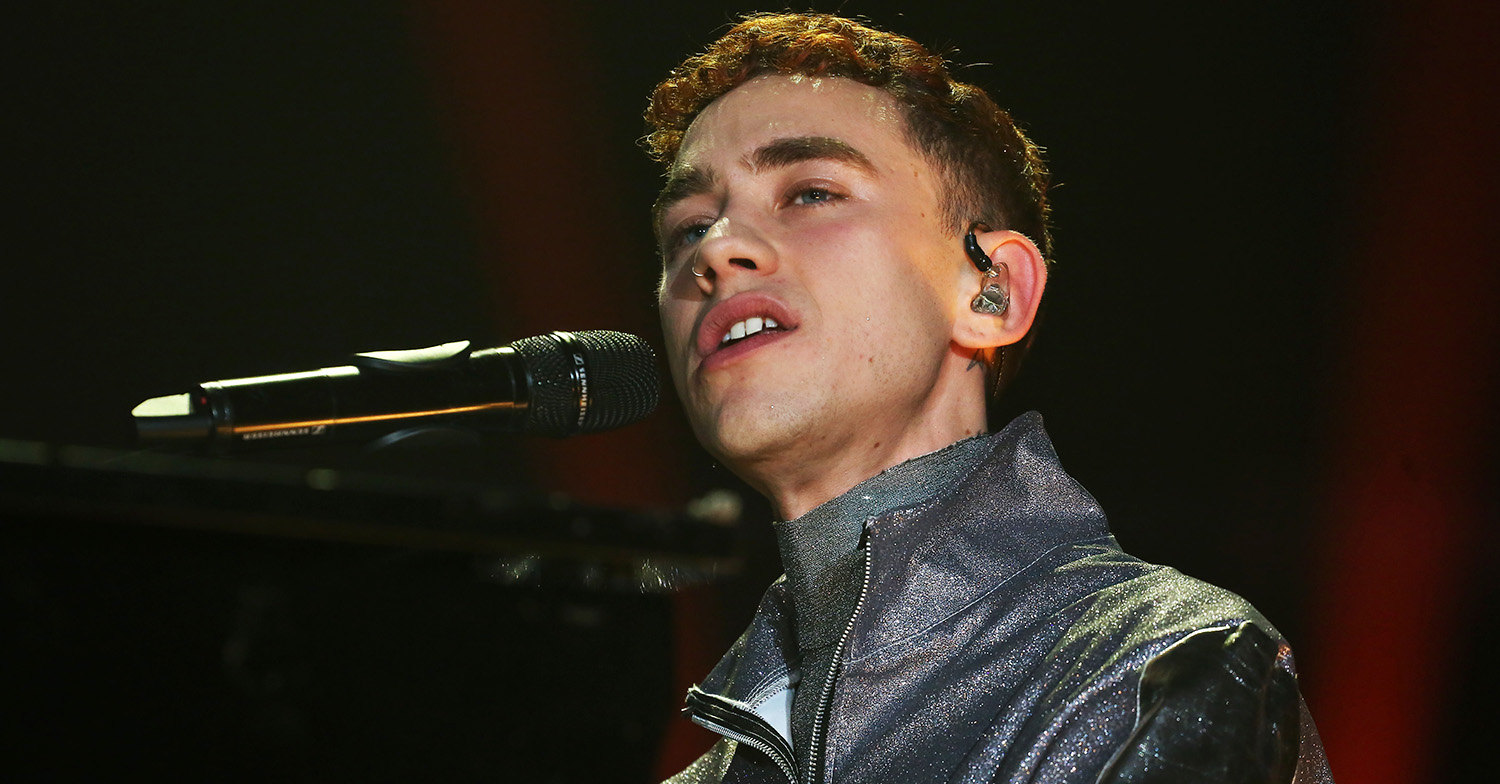 olly alexander singing on stage