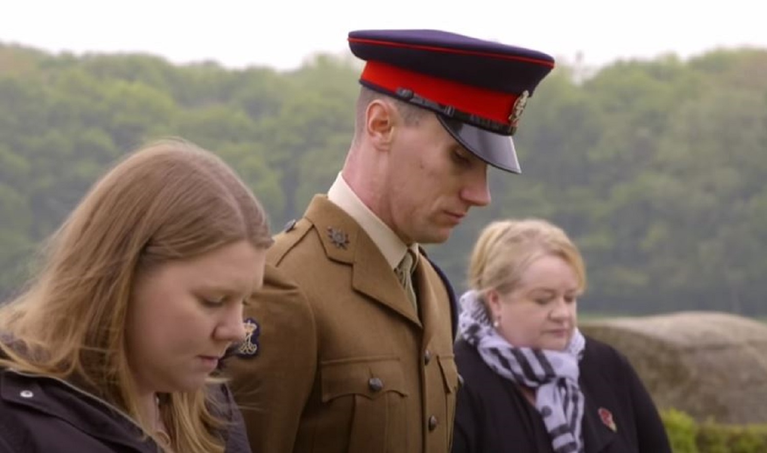 Relatives of an unknown soldier at a funeral