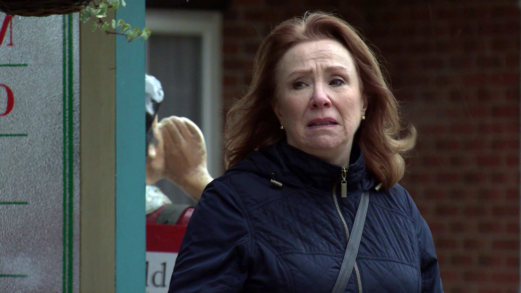 Coronation Street star Melanie Hill as Cathy Matthews looks upset and scared