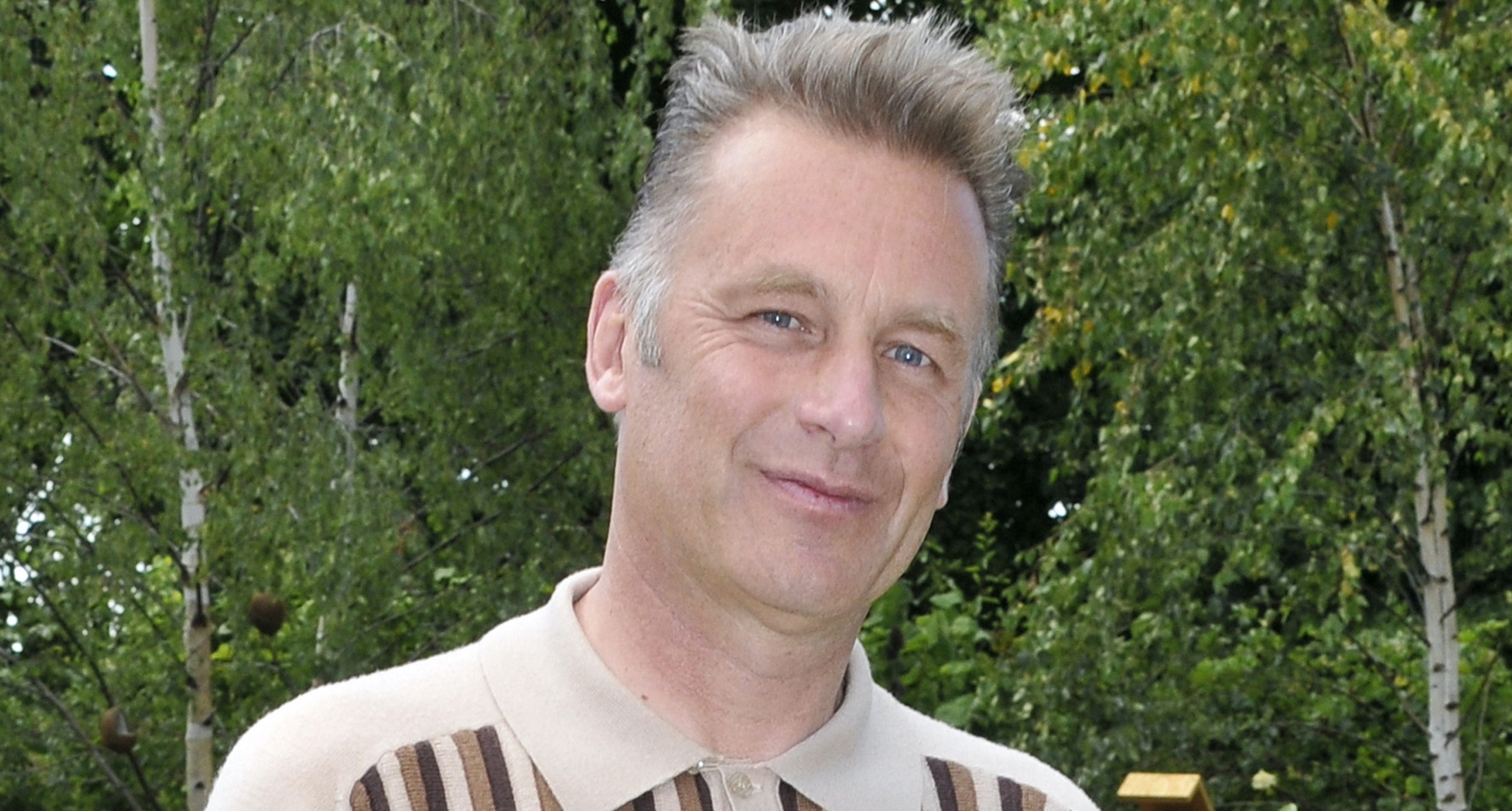 Chris Packham in a field
