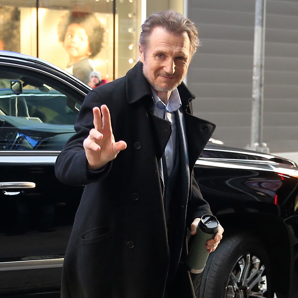 Liam Neeson arrives at a TV studio