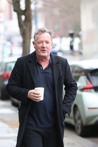Piers Morgan grabs a drink