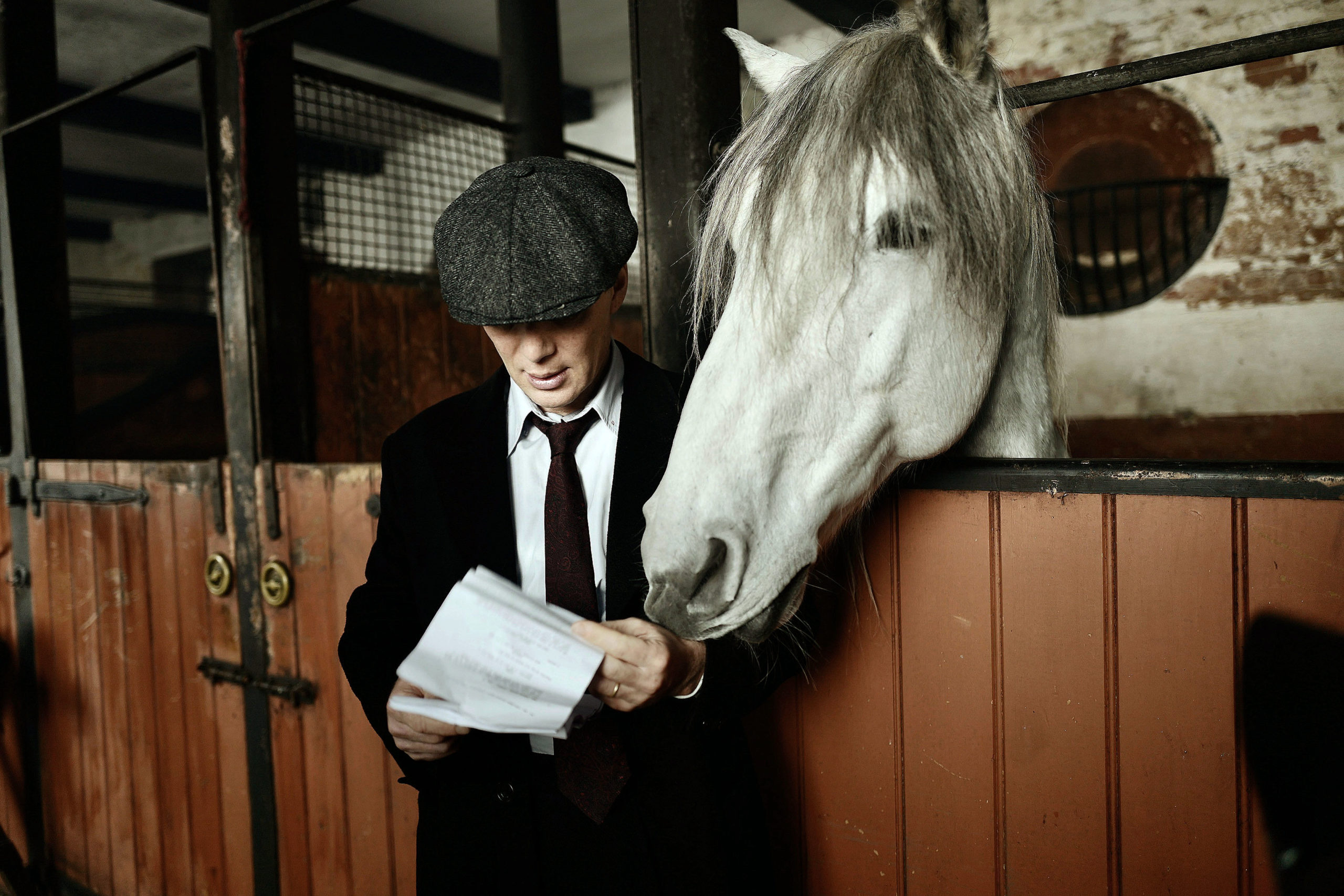 Cillian Murphy plays Tommy Shelby in Peaky Blinders (Credit: BBC One)