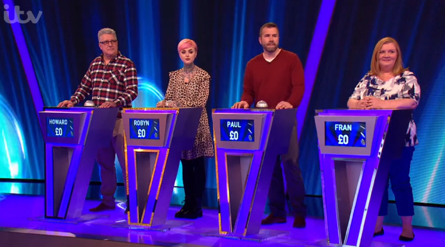 Robyn and contestants on Tipping Point