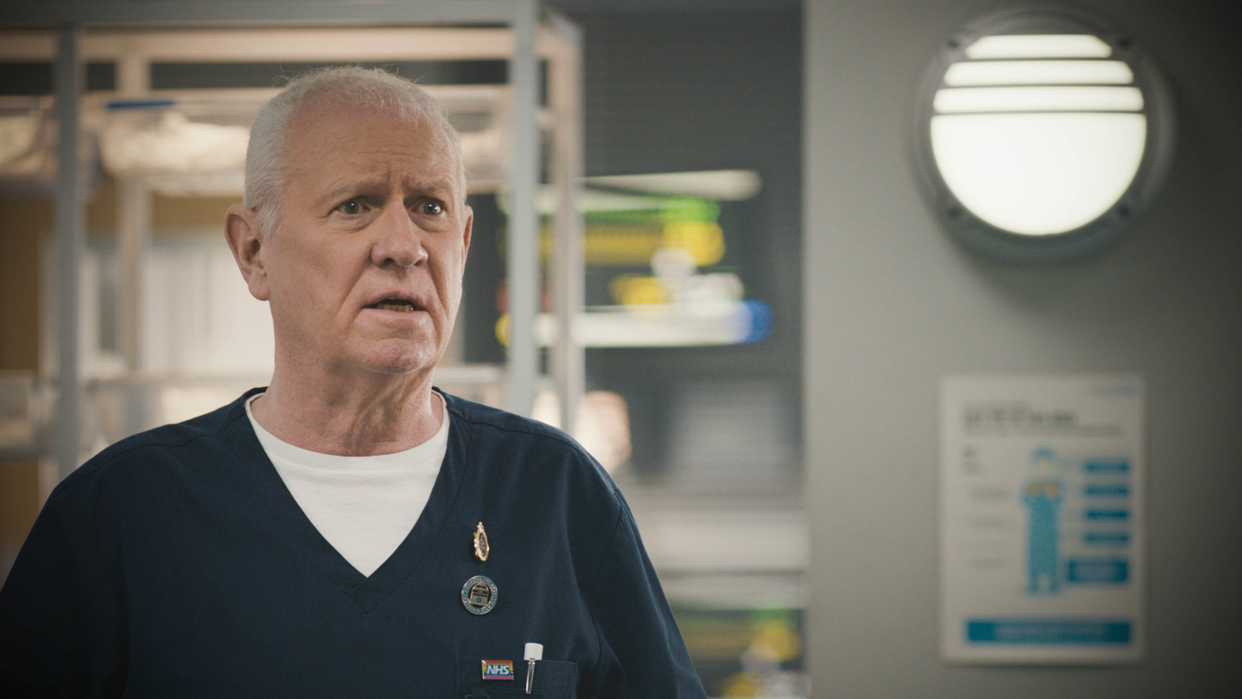 Derek Thompson as Charlie in Casualty looking panicked