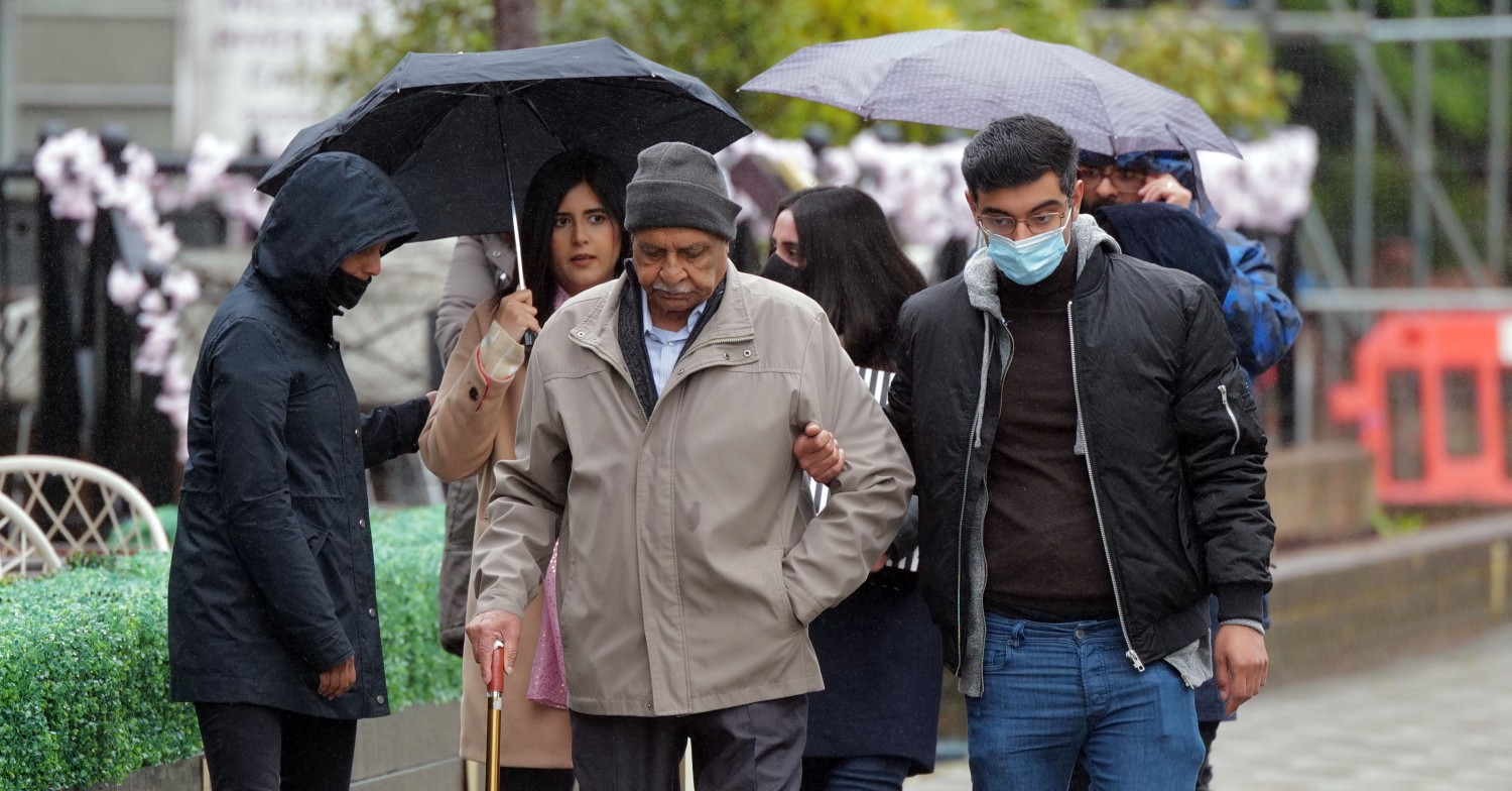 People walking in rain