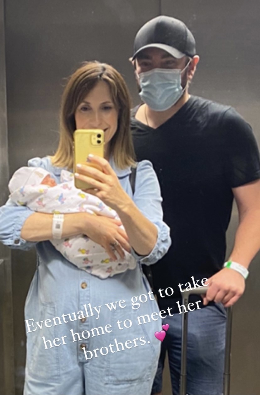 Alex Jones and her baby daughter
