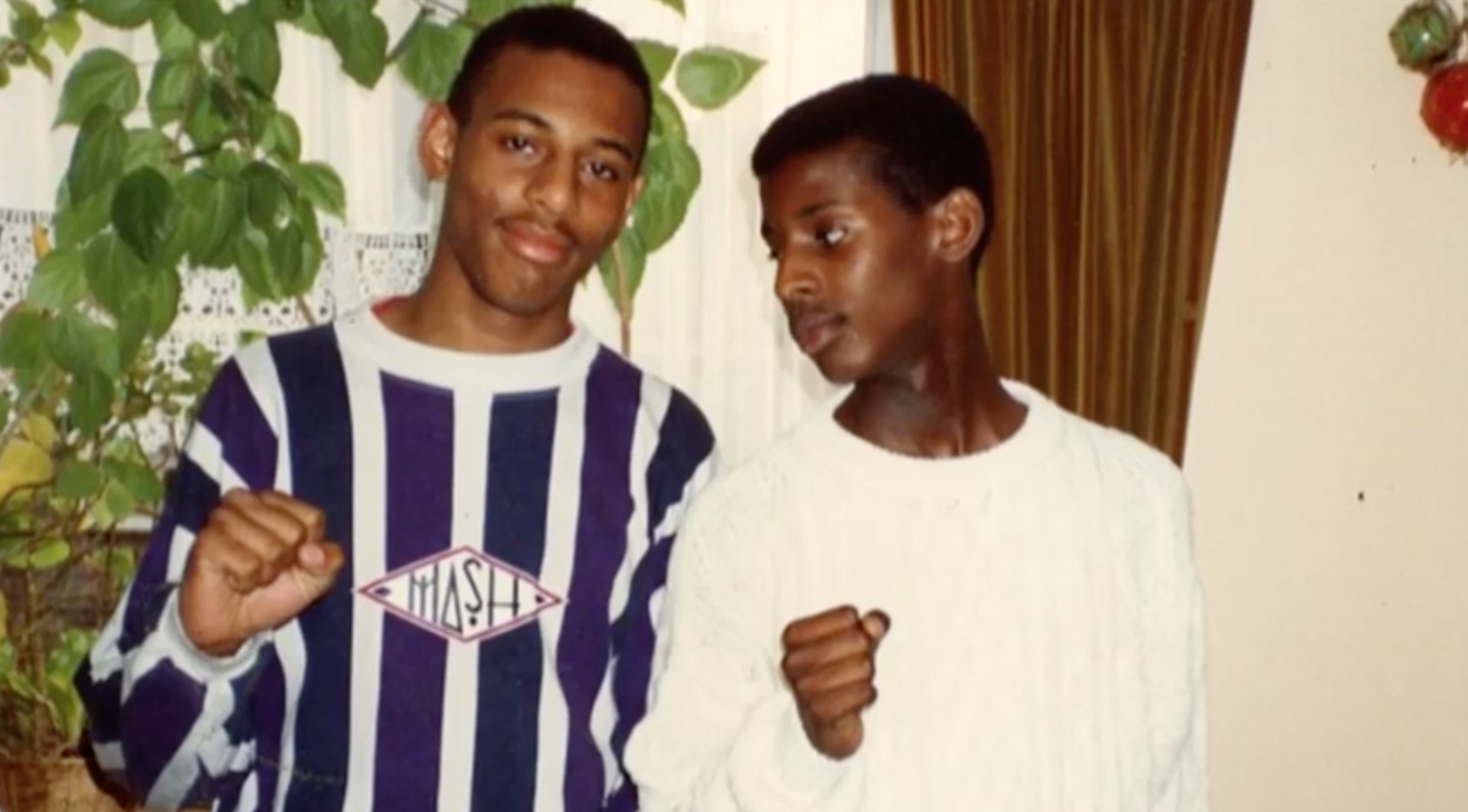 Stephen Lawrence in striped shirt