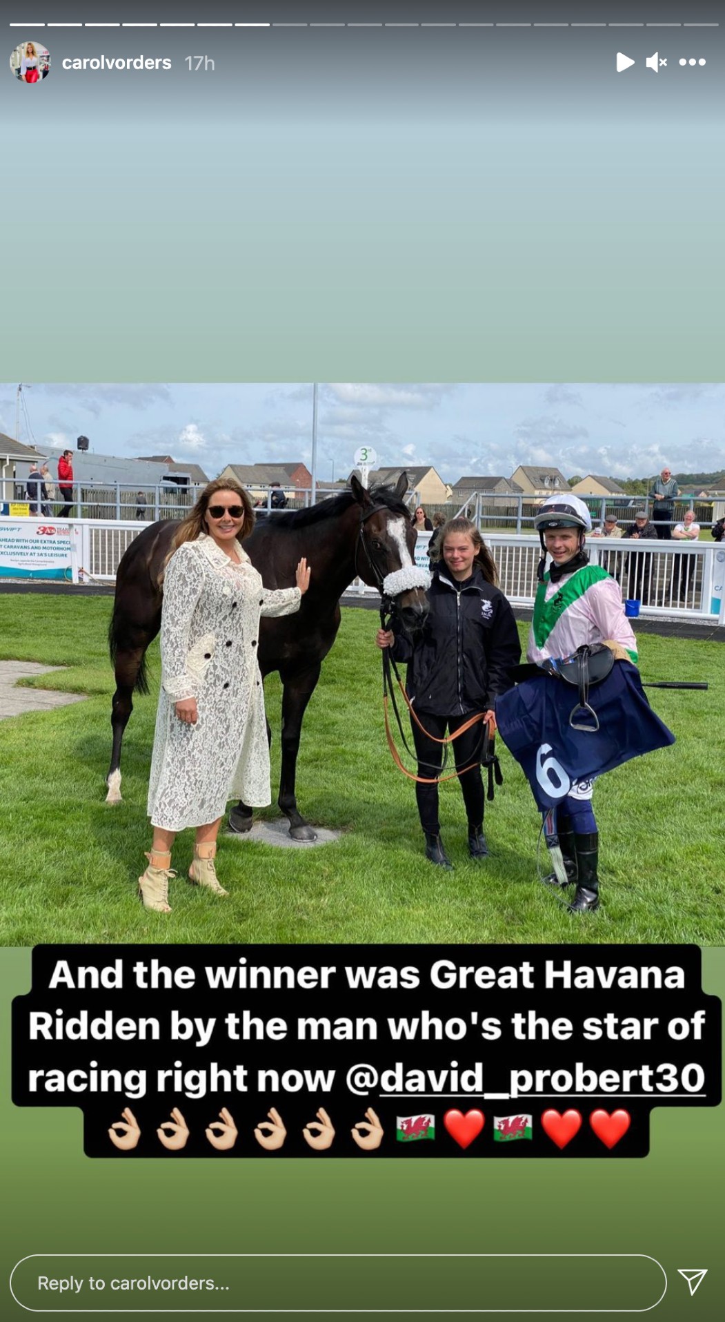 Carol Vorderman in a cream lace coat at the horse races