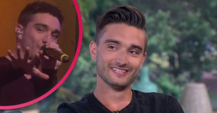 Tom Parker of The Wanted with an inset of himself on stage