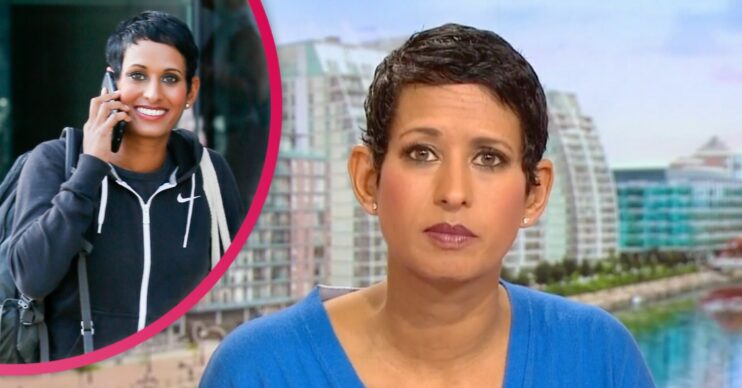 Naga Munchetty looks down the camera in a blue dress hosting BBC Breakfast