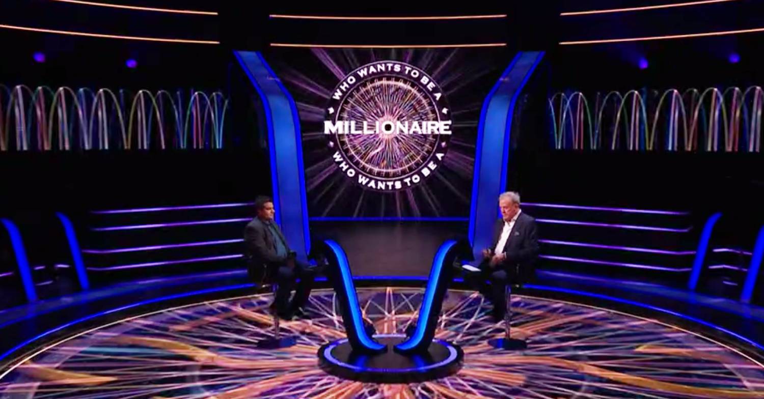 Jeremy Clarkson sits across from Mindy on Who Wants to Be a Millionaire?