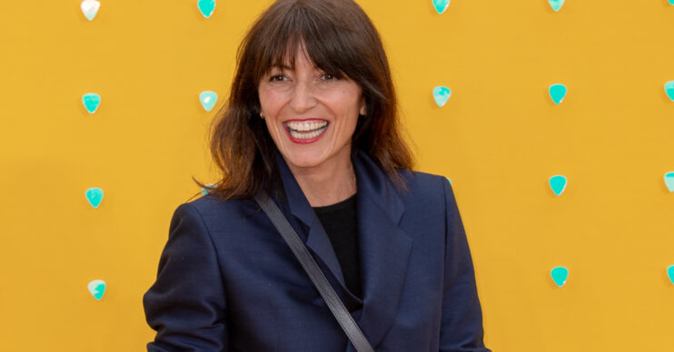 Davina McCall smiles on the red carpet