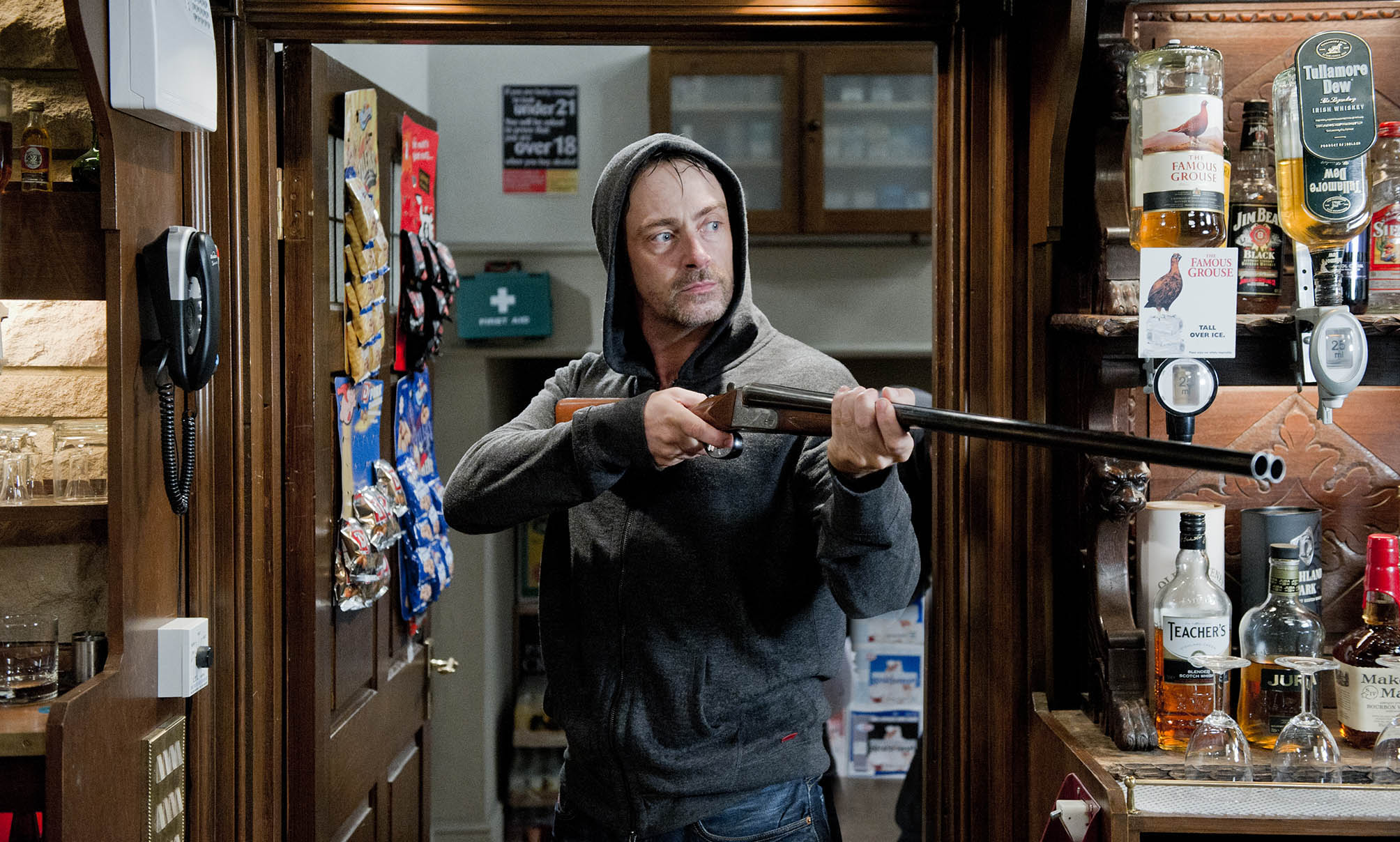 Cameron Murray holds the Woolpack hostage with a shotgun
