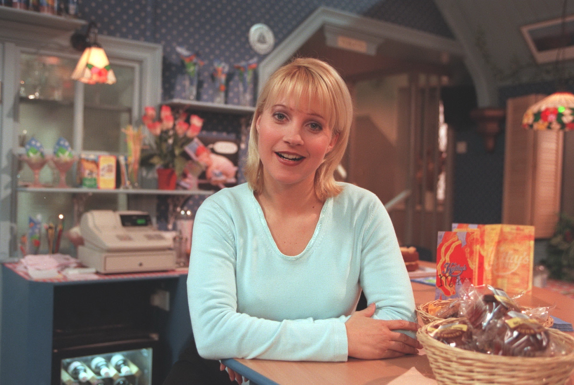 Kathy Glover in Emmerdale poses in Kathy's cafe