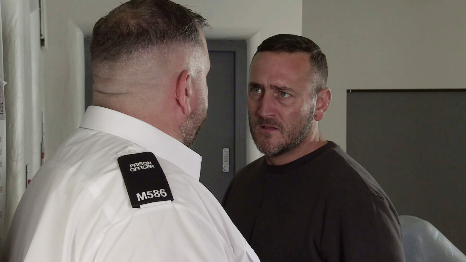 Harvey looks menacing as he demands the prison guard take him to hospital