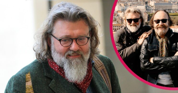 The Hairy Bikers' Si King smiling and posing on his bike with pal Dave Myers