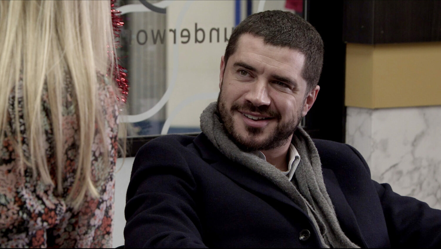 Coronation Street Adam Barlow smiles as wife Sarah tells him she might be pregnant