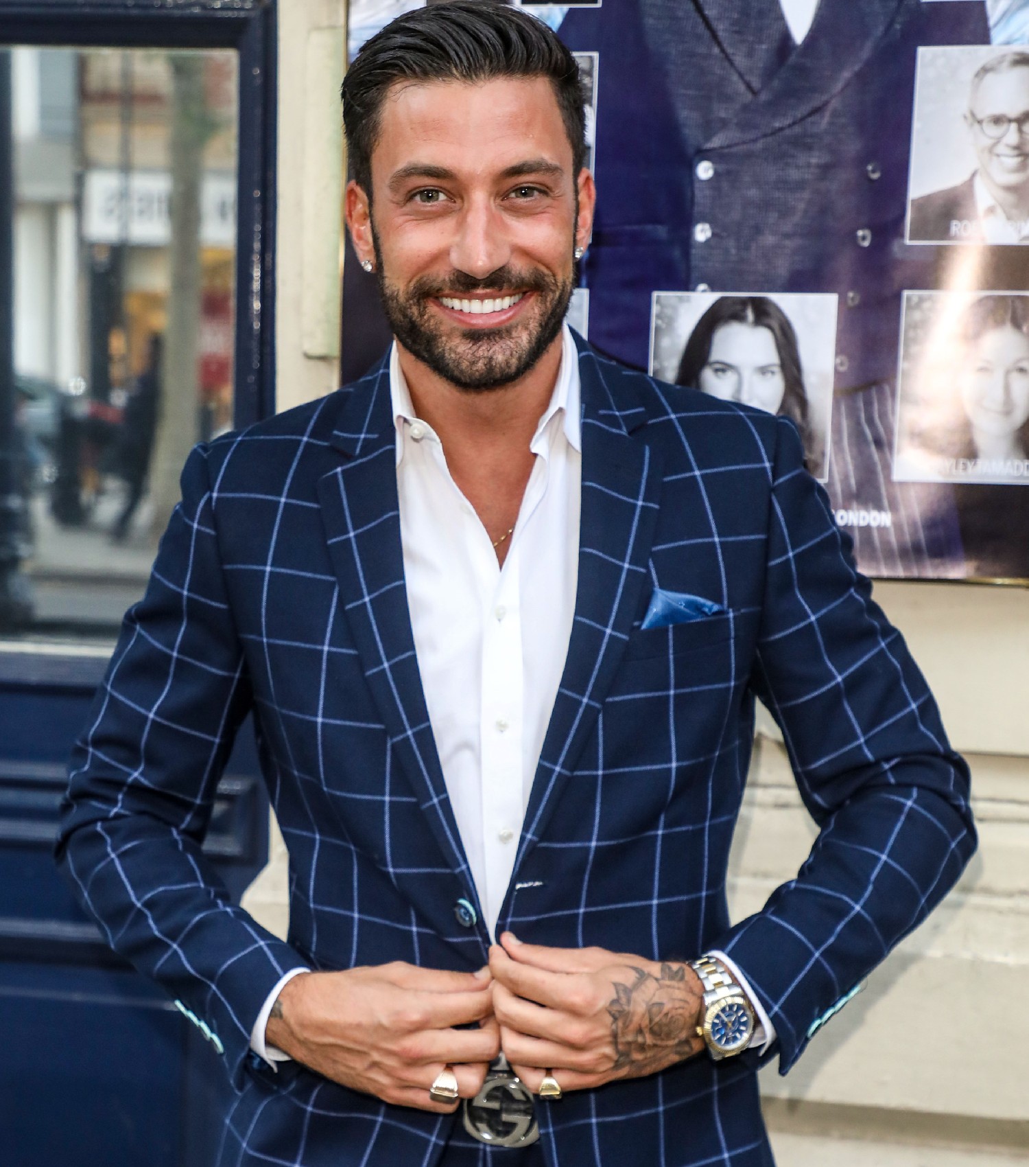 Giovanni Pernice wears blue blazer and smiles