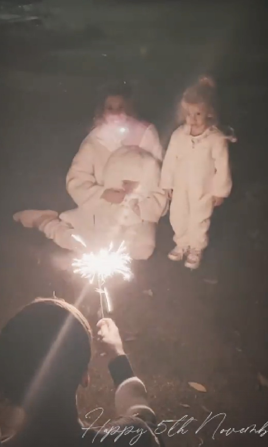 Stacey Solomon on bonfire night with Rex, Rose and Zachary