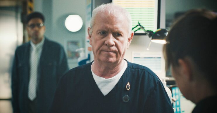 Casualty star Derek Thompson looking gloom as Charlie is in danger in this week's Casualty (Credit: BBC)