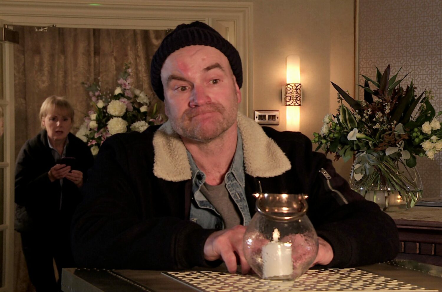 Coronation Street 19 Jan Spotting Tim in the hotel bar with a bottle of fizz and two glasses, Sally confronts him.
