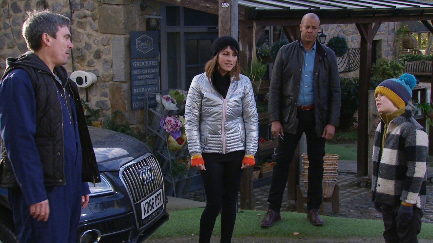 Emmerdale Cain is worried to see Al approaching his car with Kyle and Kerry