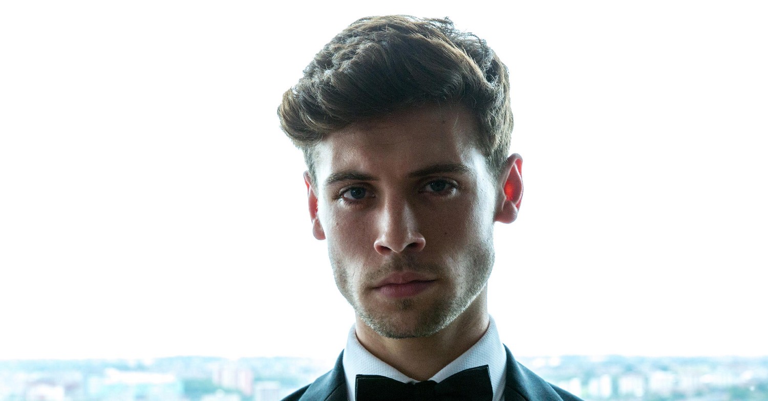 Joe Tate looking serious in Emmerdale (Credit: ITV)