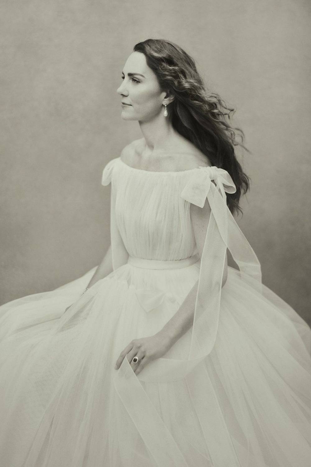 Kate faces away from the camera for this shot - but her ring is on display