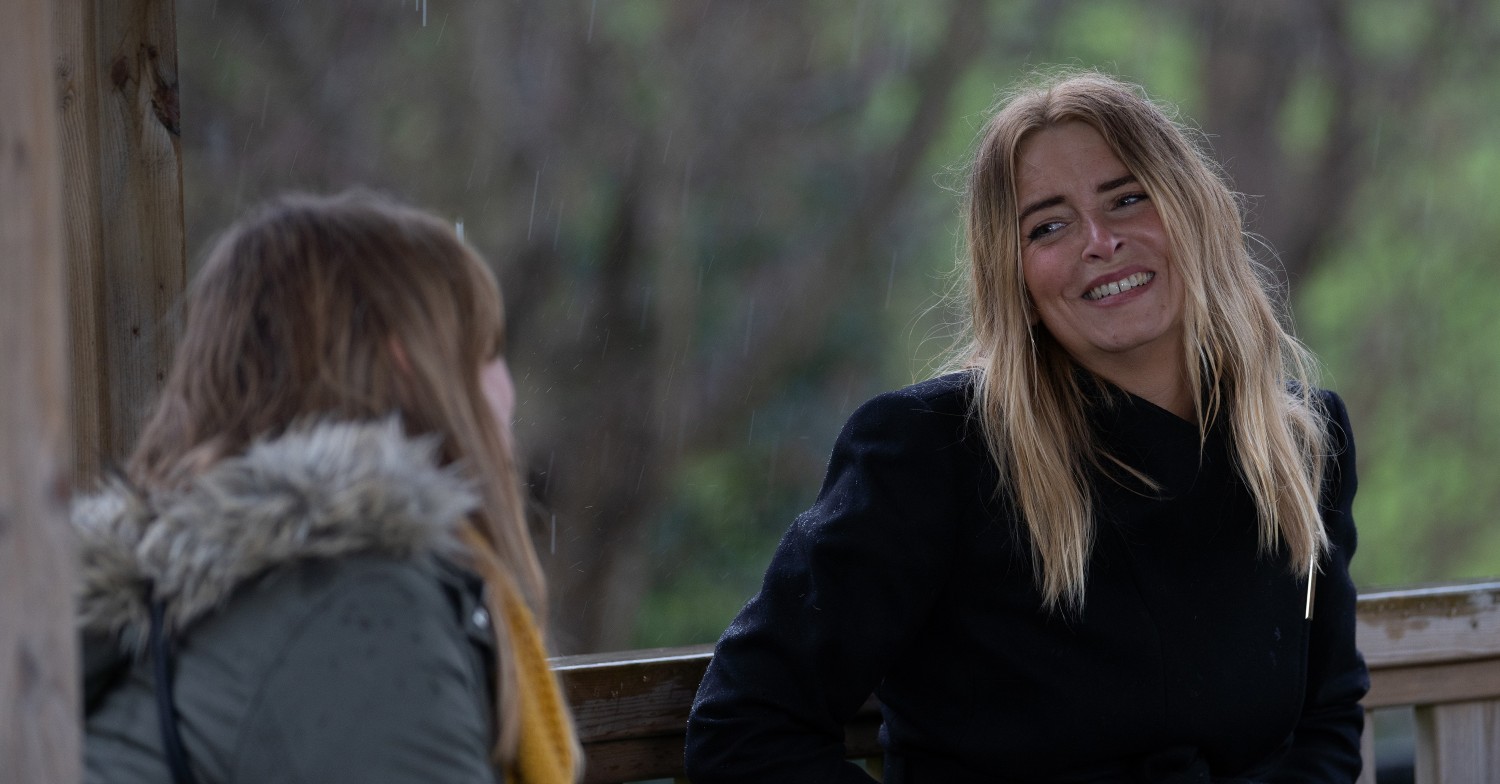 Charity and Vanessa laughing and smiling on Emmerdale