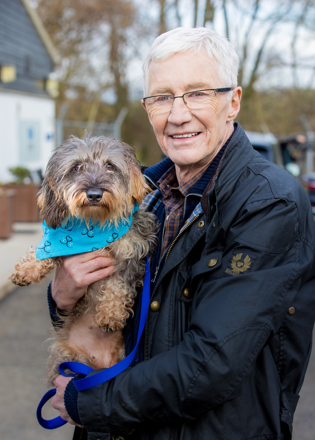 Paul O'Grady smiles to the camera 