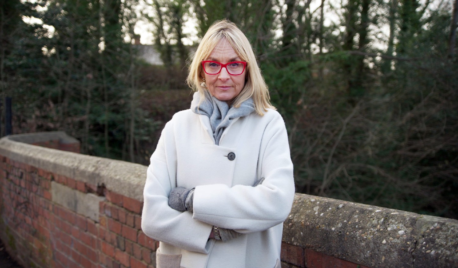 Louise Minchin looking stern wearing red glasses