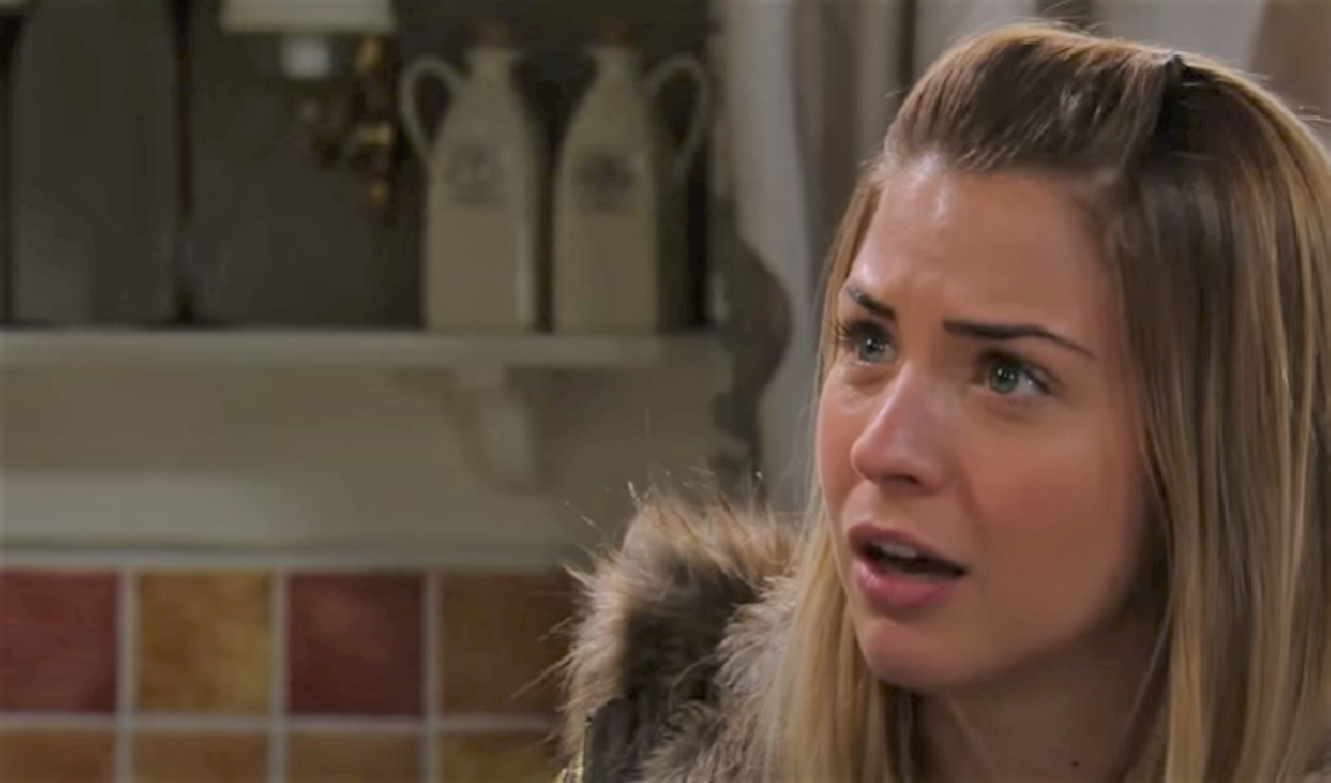 Carly Hope looking shocked in Emmerdale