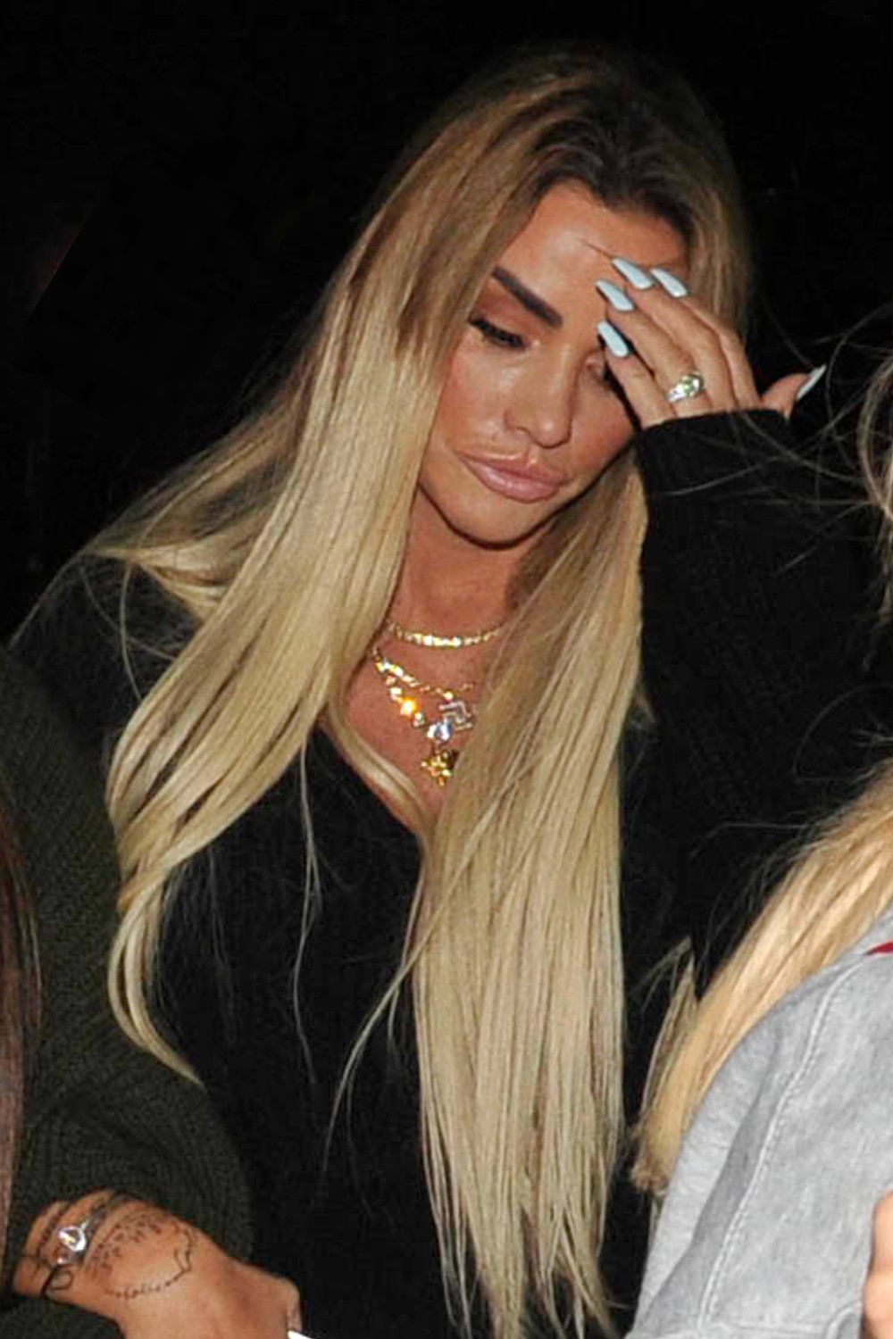 Katie Price looked upset wearing her engagement ring